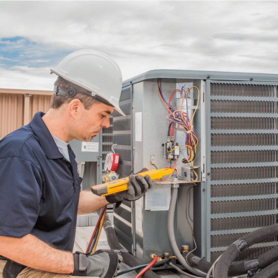Guelph HVAC Pro HVAC technician servicing a system